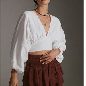 V-Neck ivory blouse with tie detail